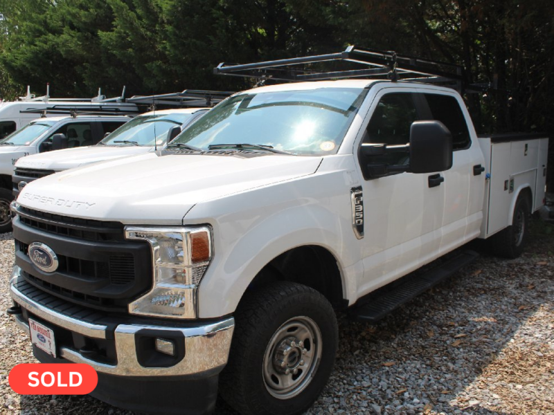 LIVE AND ONLINE ABSOLUTE AUCTION: SERVICE TRUCKS, VEHICLES AND EQUIPMENT