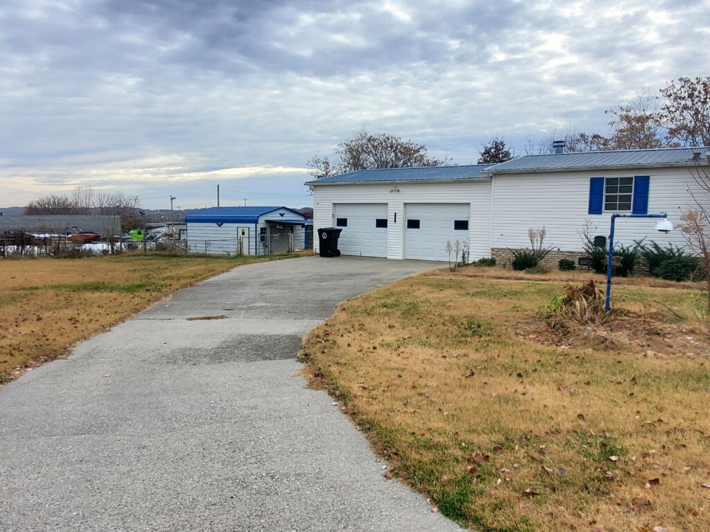 REAL ESTATE AUCTION in Talbott, TN - Subject to Court Confirmation