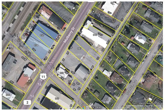 ABSOLUTE REAL ESTATE AUCTION: COMMERCIAL BUILDINGS, TWO ADJOINING PROPERTIES BEING SOLD AS ONE IN LOUDON, TN
