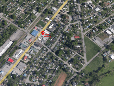ABSOLUTE REAL ESTATE AUCTION: COMMERCIAL BUILDINGS, TWO ADJOINING PROPERTIES BEING SOLD AS ONE IN LOUDON, TN