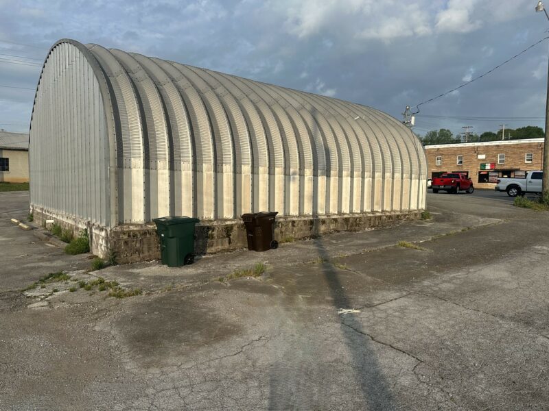 ABSOLUTE REAL ESTATE AUCTION: COMMERCIAL BUILDINGS, TWO ADJOINING PROPERTIES BEING SOLD AS ONE IN LOUDON, TN